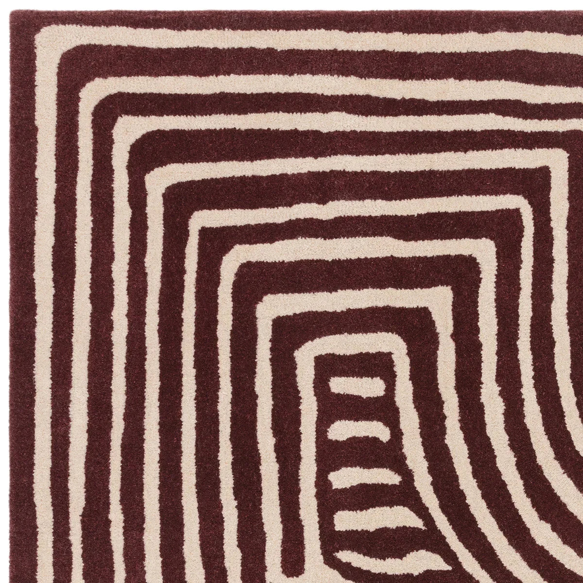 Asiatic Reef Curve Plum Rug featuring curved bands in plum and beige on cream background, hand-tufted wool