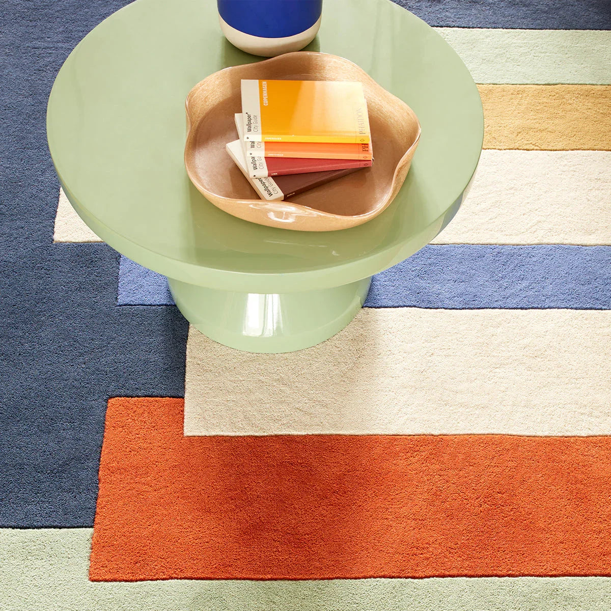 Asiatic Reef Stacks Multi Designer Rug featuring color-block geometric pattern in navy blue, cream, beige and orange on pale background, power-loomed polyester