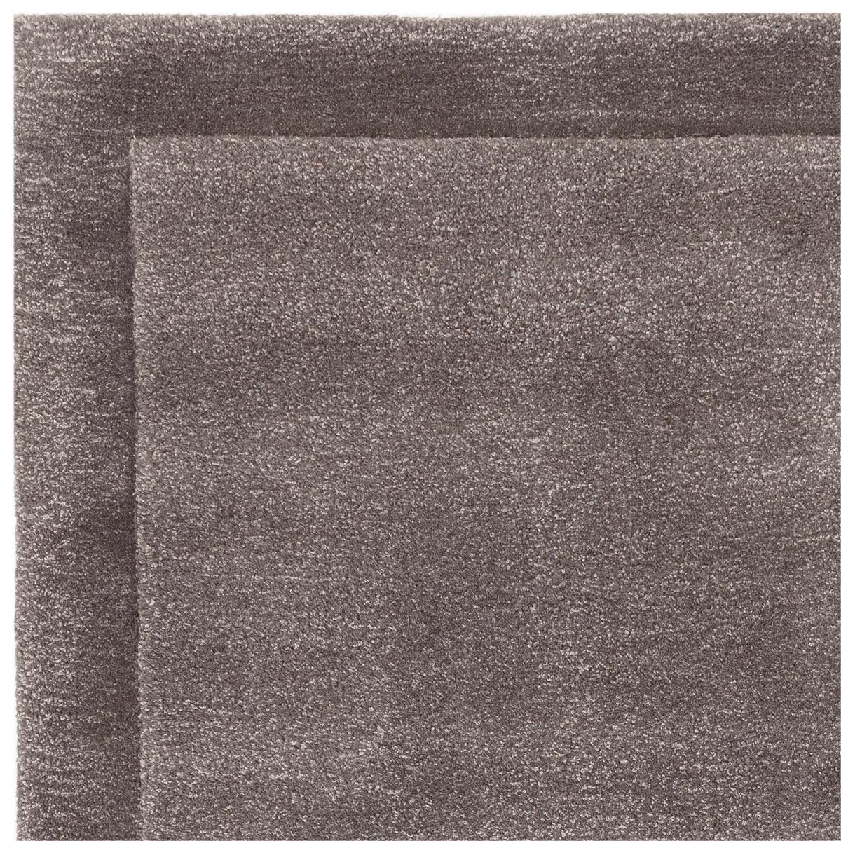 Asiatic Rise Charcoal rug featuring textured solid pattern in charcoal and light grey on charcoal, machine-made wool