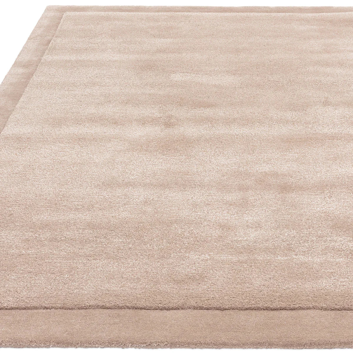 Asiatic Rise Sand Designer Rug featuring solid color design in sand and beige on white background, machine-woven wool