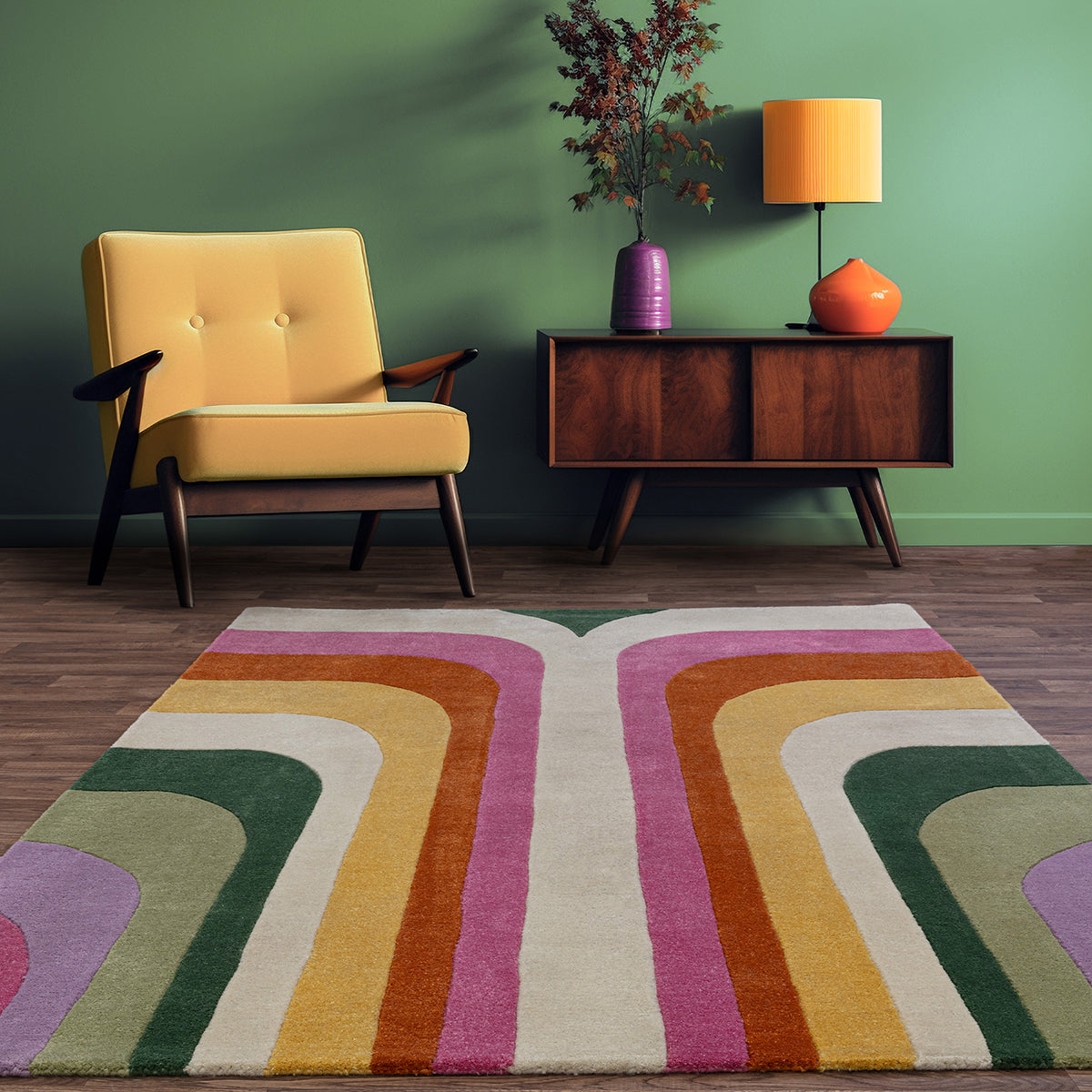 Living room with a colorful geometric rug, yellow armchair, wooden side table, and lamp.