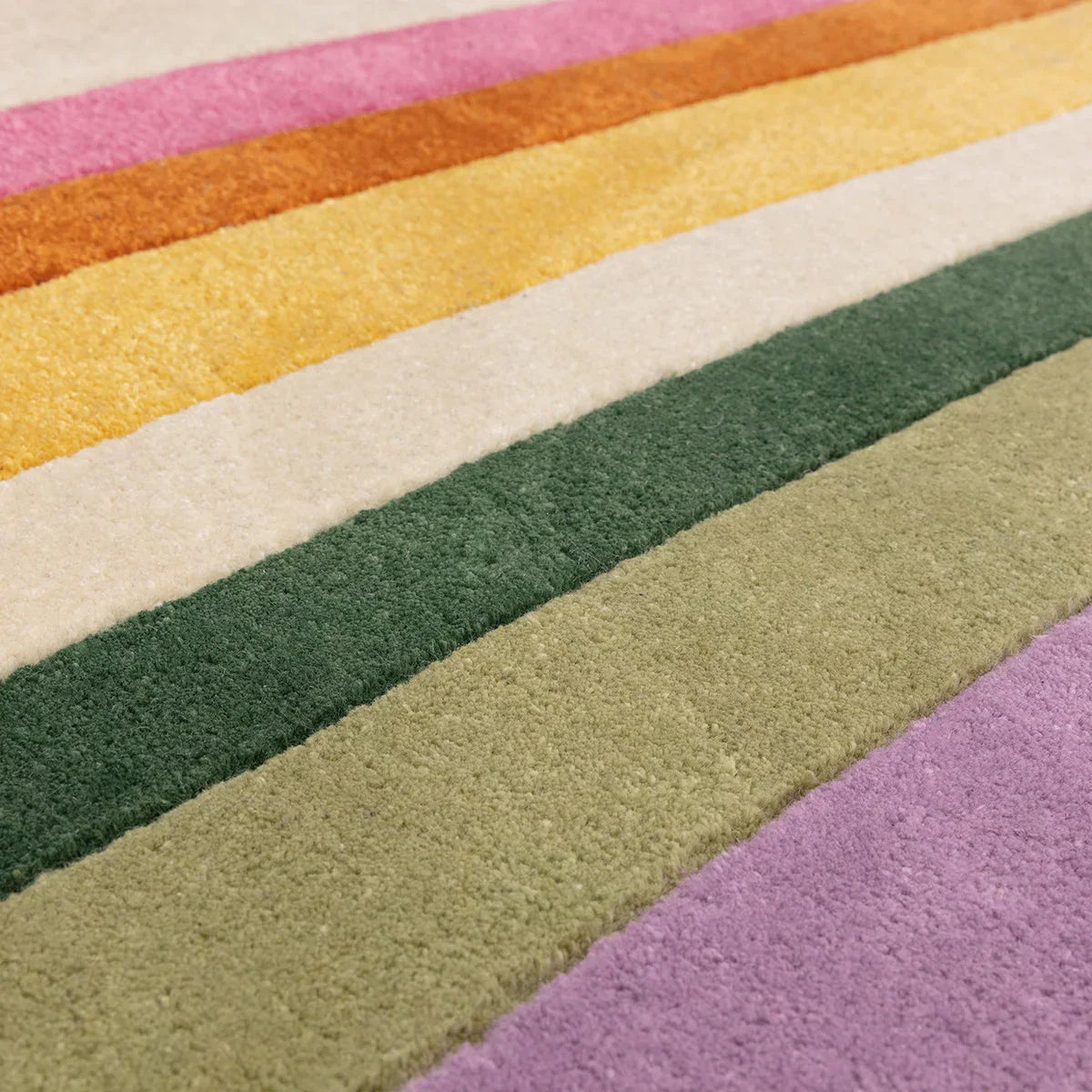 Asiatic Romy Retro Pink Designer Rug featuring striped pattern in pink, purple, orange, olive and cream on beige background, hand-tufted wool