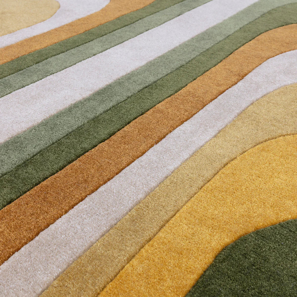 Asiatic Romy Retro Green rug featuring bold wavy stripe pattern in olive green, sage, mustard, cream and ochre on pale beige background, machine-made wool