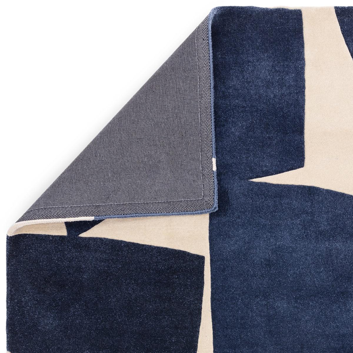 Asiatic Romy Kite Blue Designer Rug featuring geometric blocks in navy and beige on ivory background, hand-tufted wool