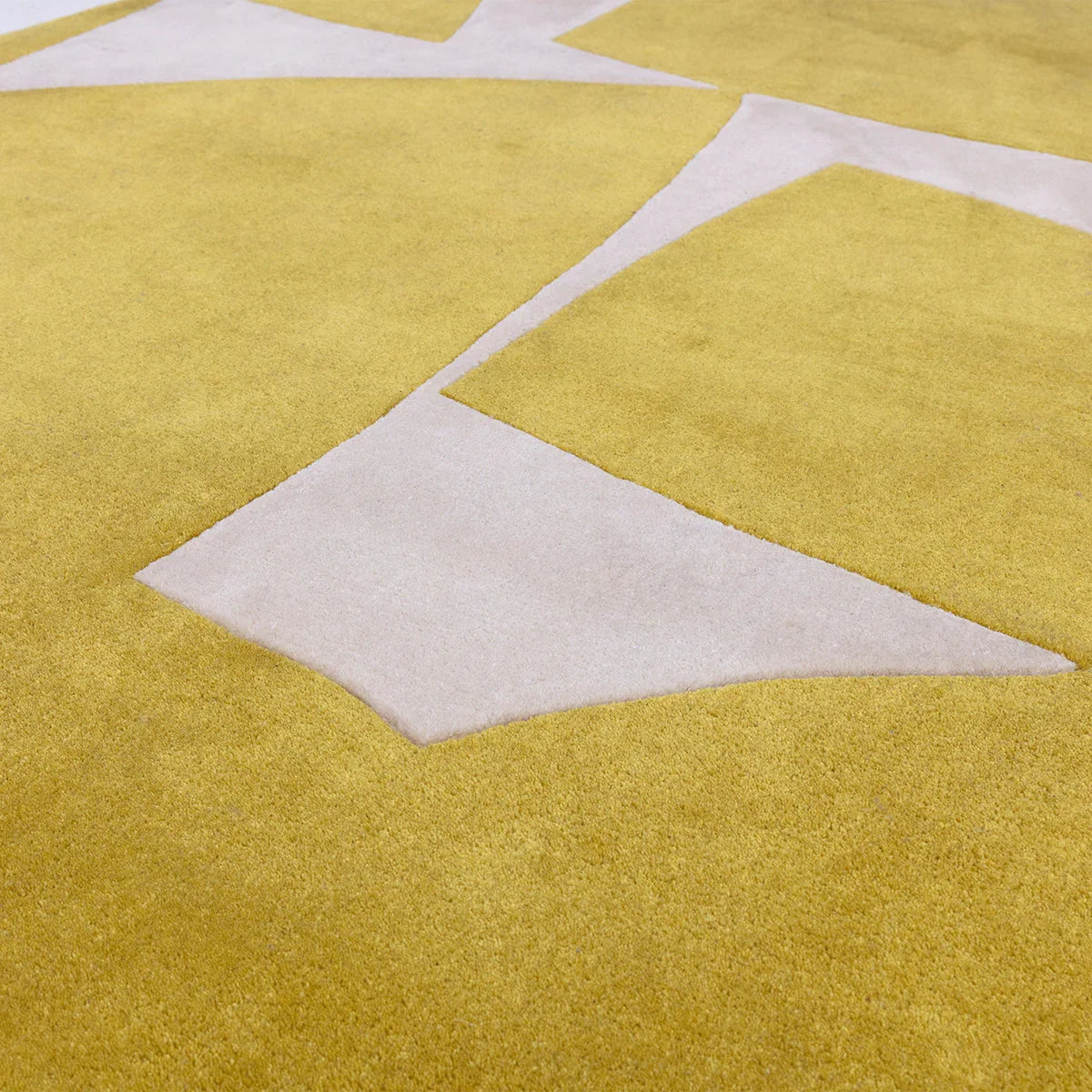 Asiatic Romy Kite Chartreuse Designer Rug featuring geometric kite pattern in white on chartreuse background, machine-made wool