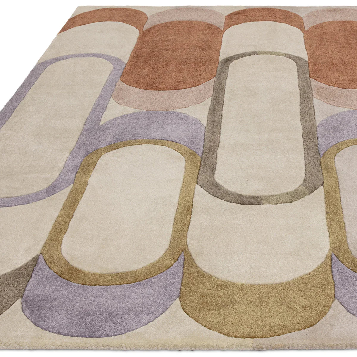 Asiatic Romy Module Pastel rug featuring abstract curved blocks in cream, lavender, sage on beige; hand-tufted wool