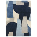 Geometric patterned rug with blue, beige, and gray colors on a white background