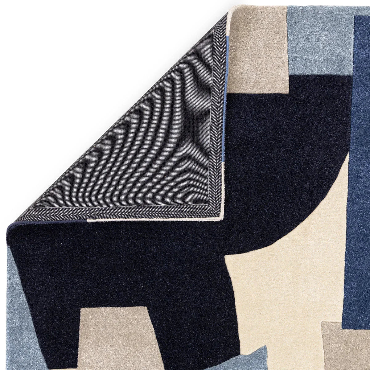 Asiatic Romy Element Blue Rug featuring abstract geometric pattern in navy, beige, light blue and cream on pale background, machine-made