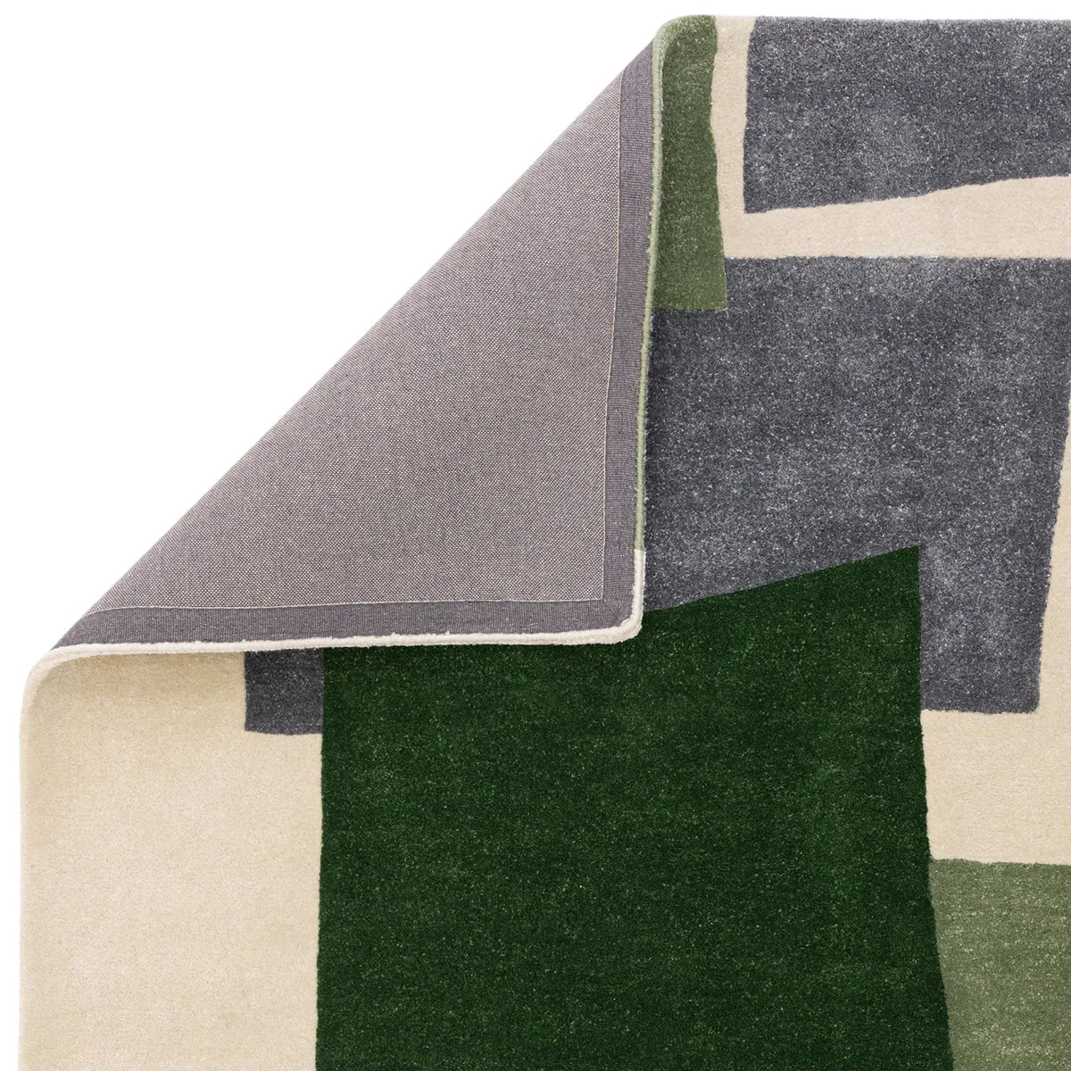 Asiatic Romy Papercut Green Rug featuring geometric blocks in forest green, sage, beige and charcoal on cream background, hand-tufted wool