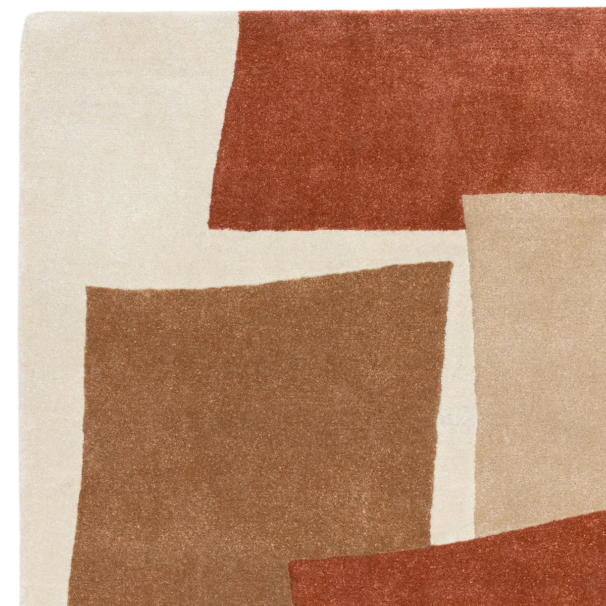 Asiatic Romy Papercut Red Designer Rug featuring abstract geometric blocks in brick red, rust, tan and cream on beige background