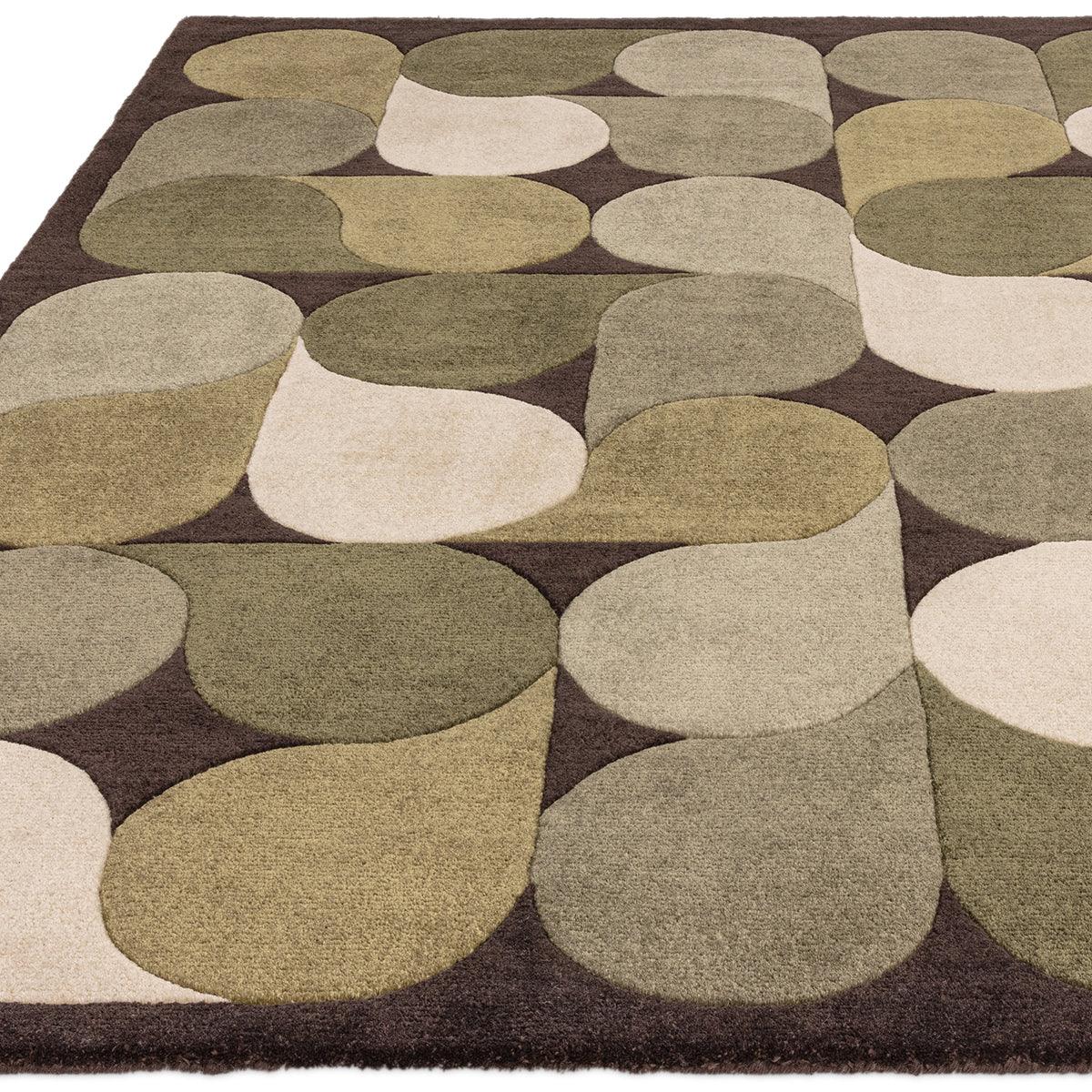 Asiatic Romy Jive Green Rug featuring pebble circular pattern in olive, sage, cream on chocolate brown background, machine-made wool