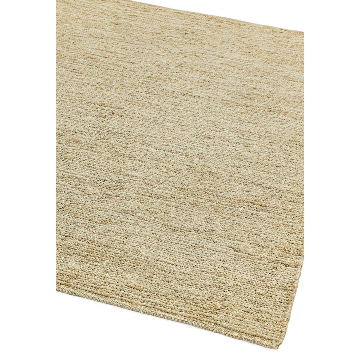 Beige textured rug on a white background