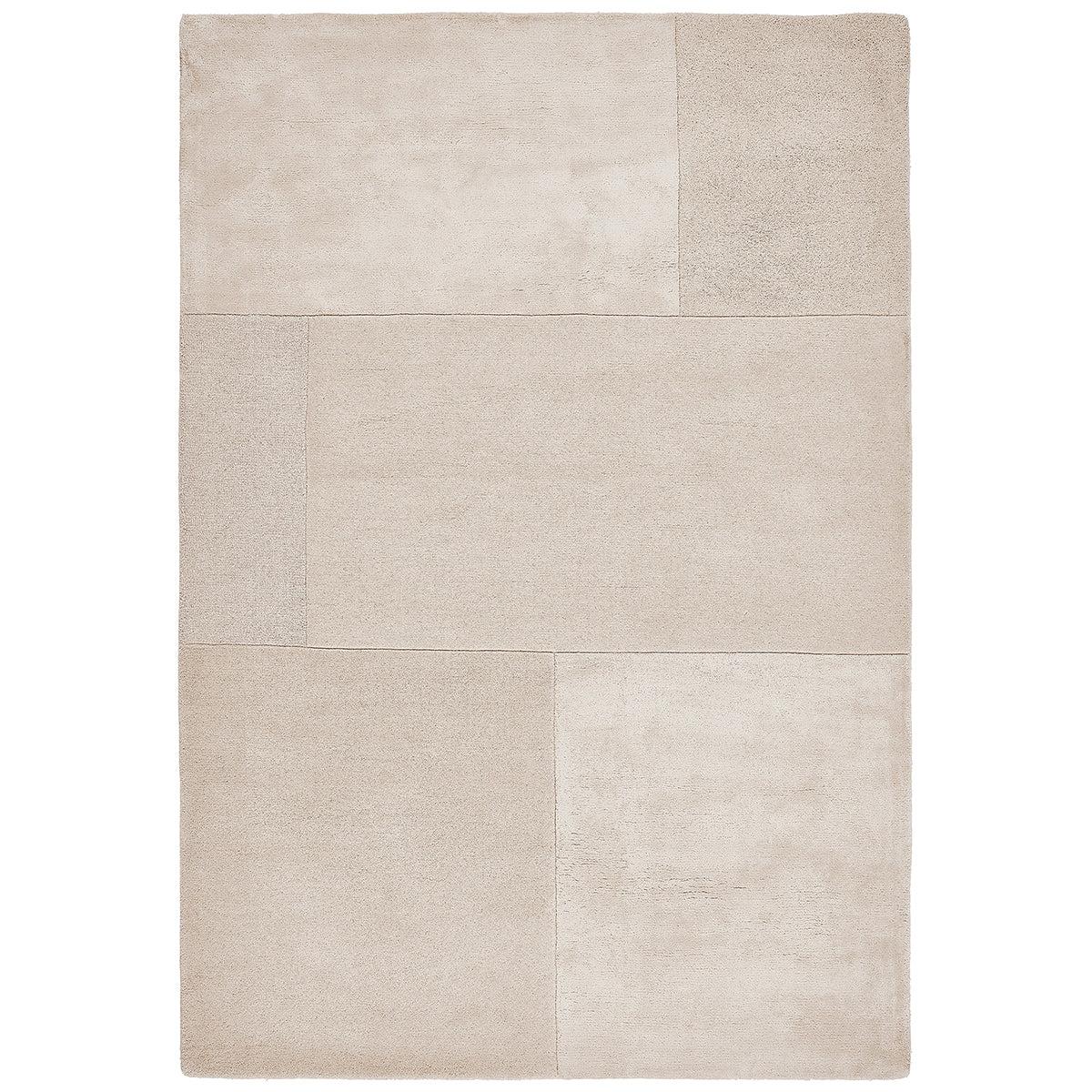 Beige rug with a textured pattern on a white background