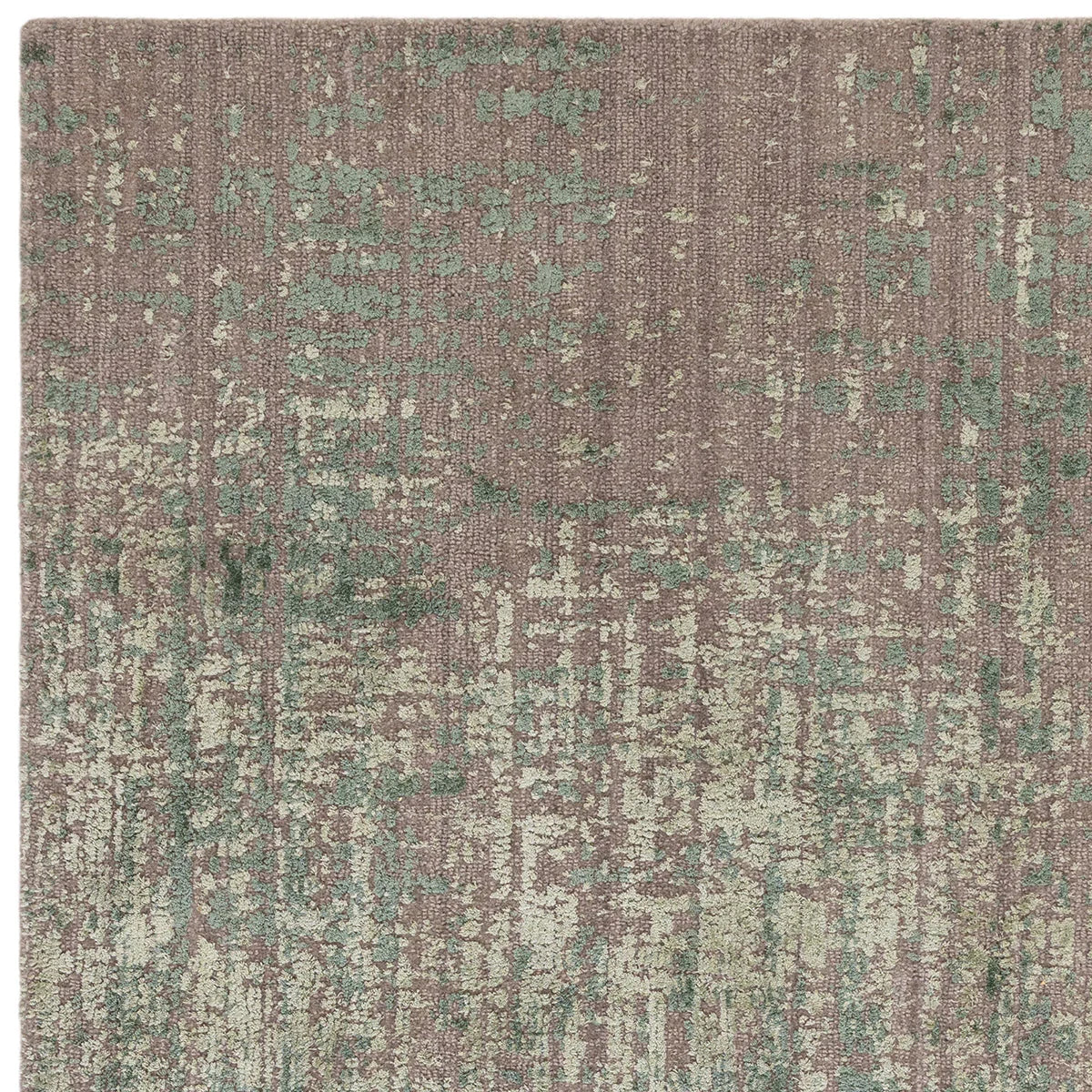 Asiatic Torino Forest Green Rug featuring abstract distressed pattern in forest green and sage on mauve background, hand-tufted wool