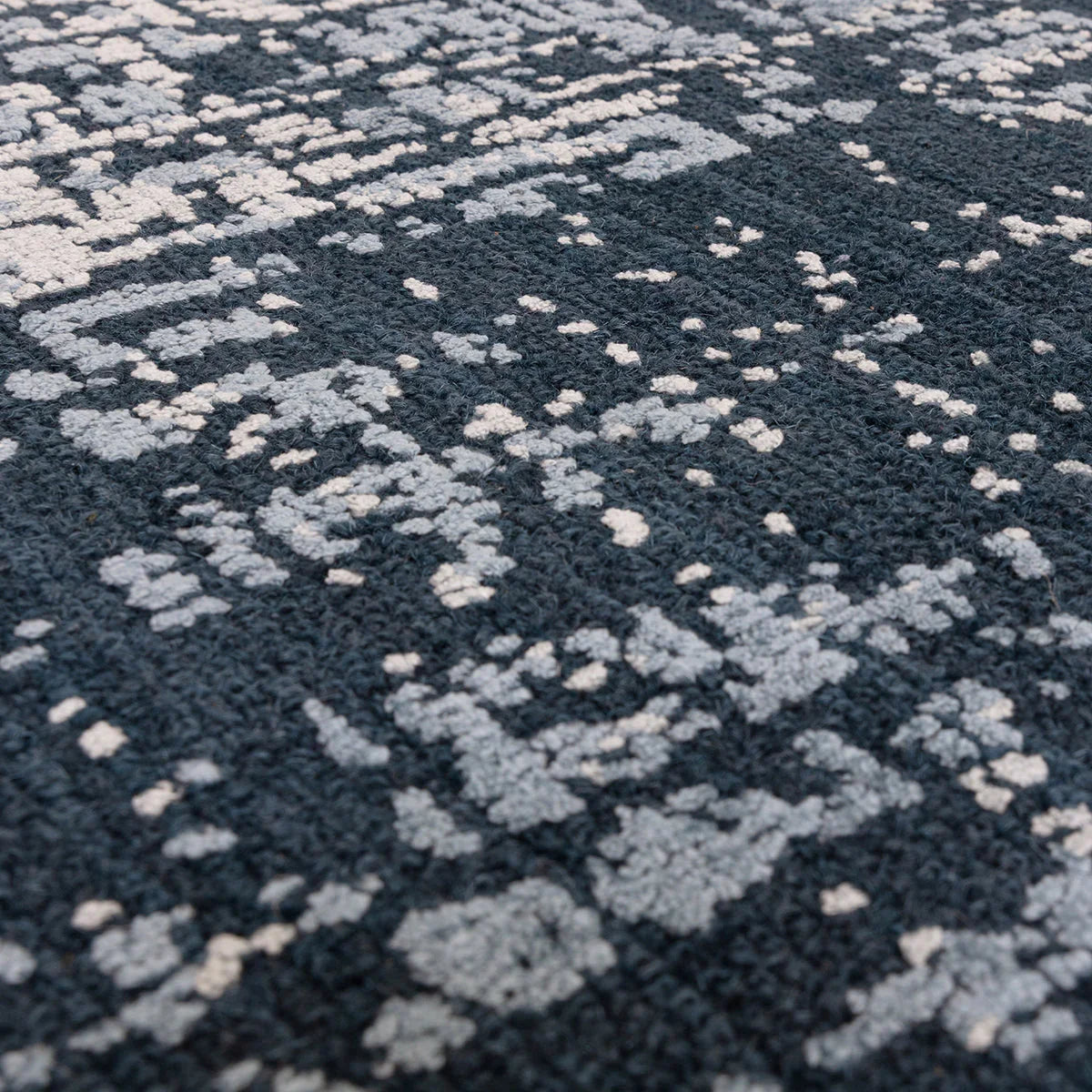Asiatic Torino Petrol Blue Designer Rug featuring abstract geometric pattern in petrol blue, light blue and ivory on navy background, machine-made