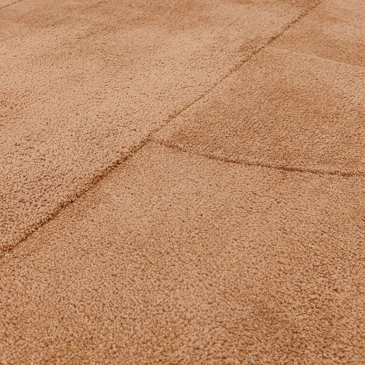 Asiatic Tova Clay Designer Rug featuring textured solid pattern in clay, tan and beige on warm beige background, hand-tufted wool
