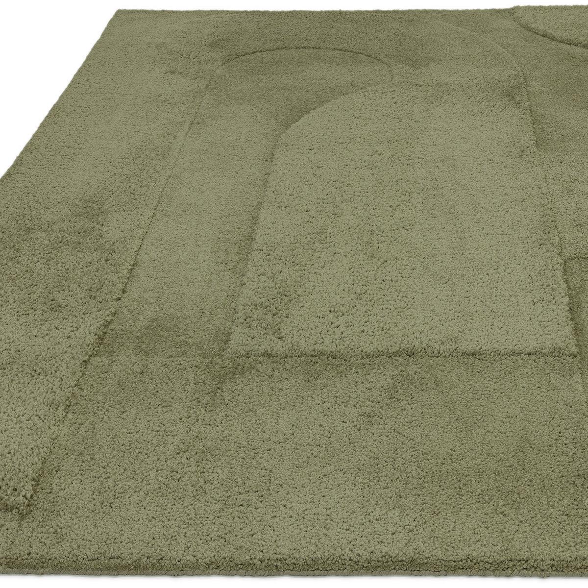 Asiatic Tova Green Designer Rug featuring subtle circular pattern in olive green on matching background, shag pile wool