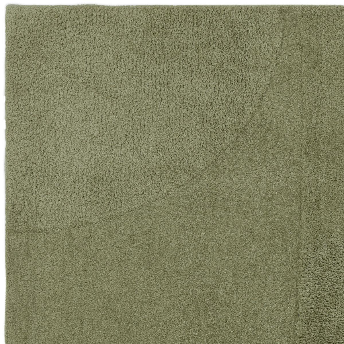 Asiatic Tova Green Designer Rug featuring solid textured design in olive green on olive background, hand-tufted wool
