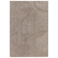 Beige area rug with abstract leaf patterns on a white background