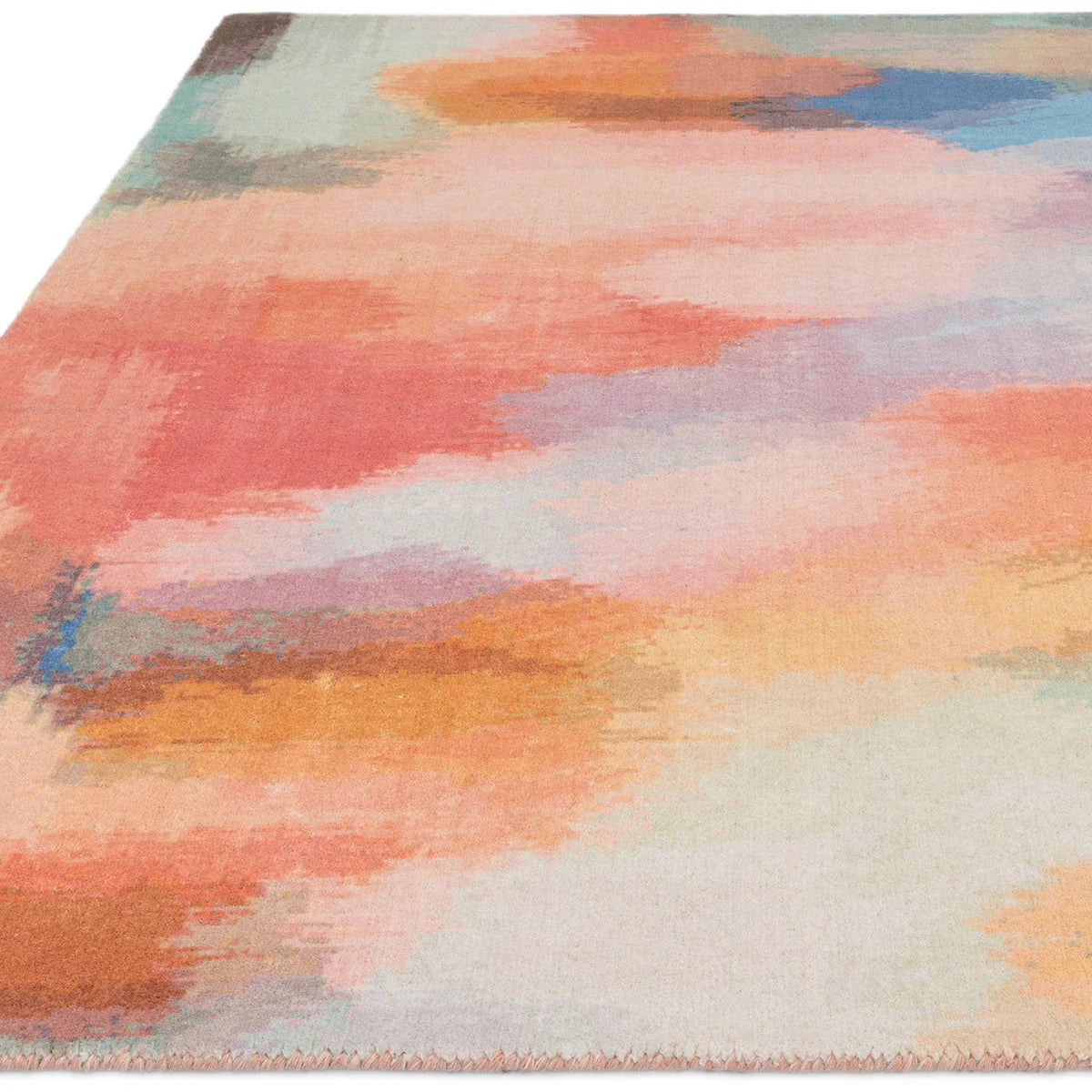 Asiatic Vision Diffuse Rug featuring abstract painterly gradient in coral, peach, blush pink, sage and pale blue on cream, hand-tufted wool