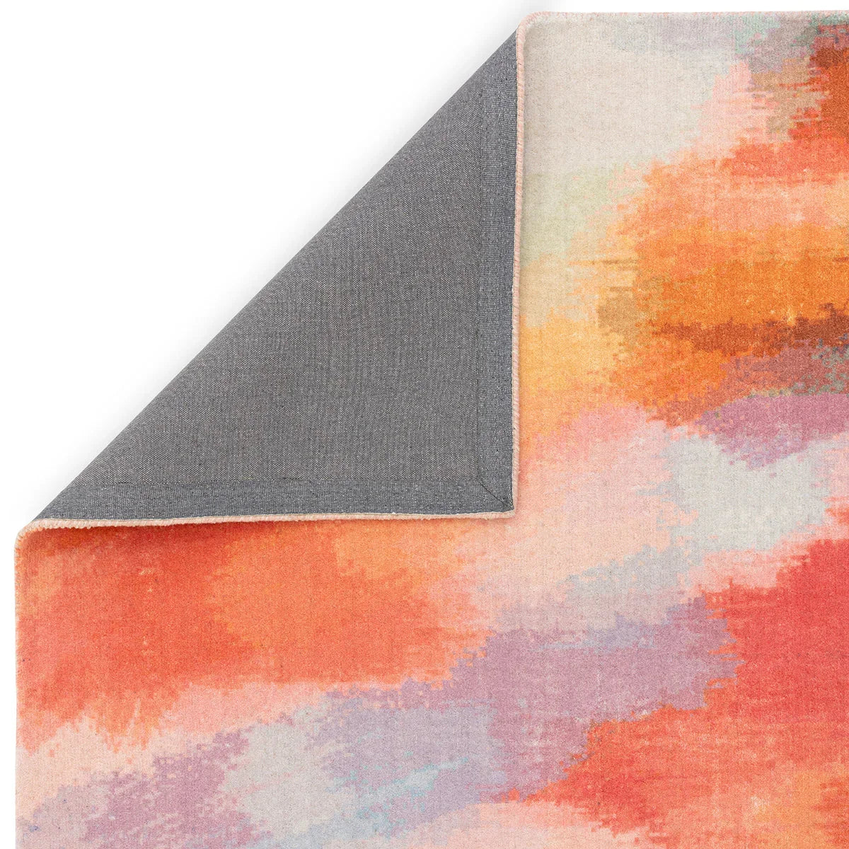 Asiatic Vision Diffuse Rug featuring abstract splash pattern in coral, peach, pink, lavender and beige on cream background, machine-woven polyester