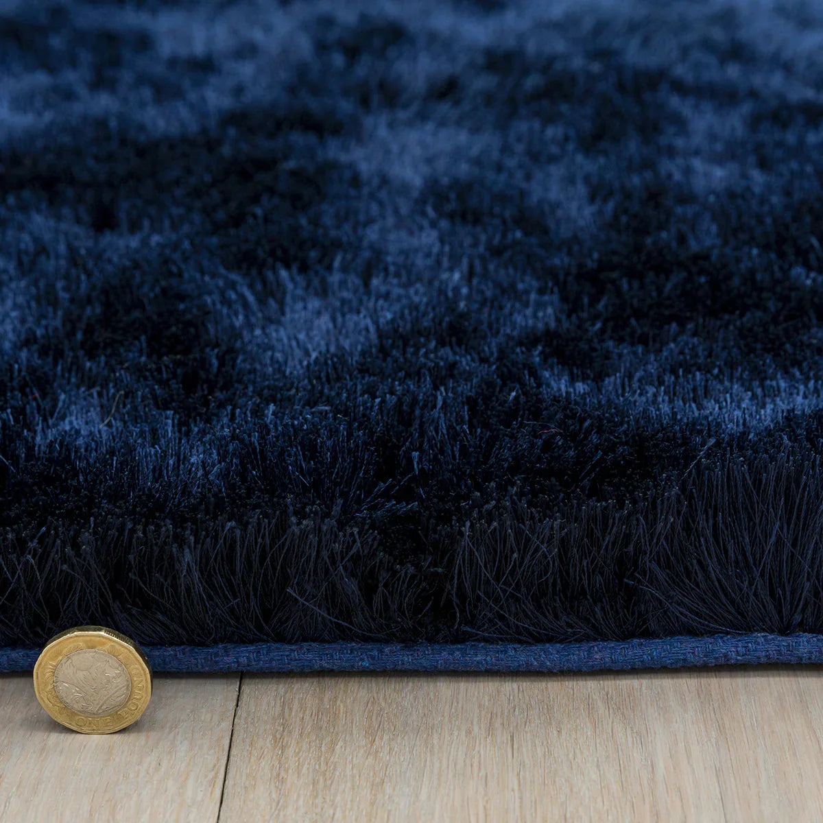 Asiatic Whisper Navy Blue Rug featuring solid shag pattern in navy and royal blue on deep navy background, machine-made synthetic blend