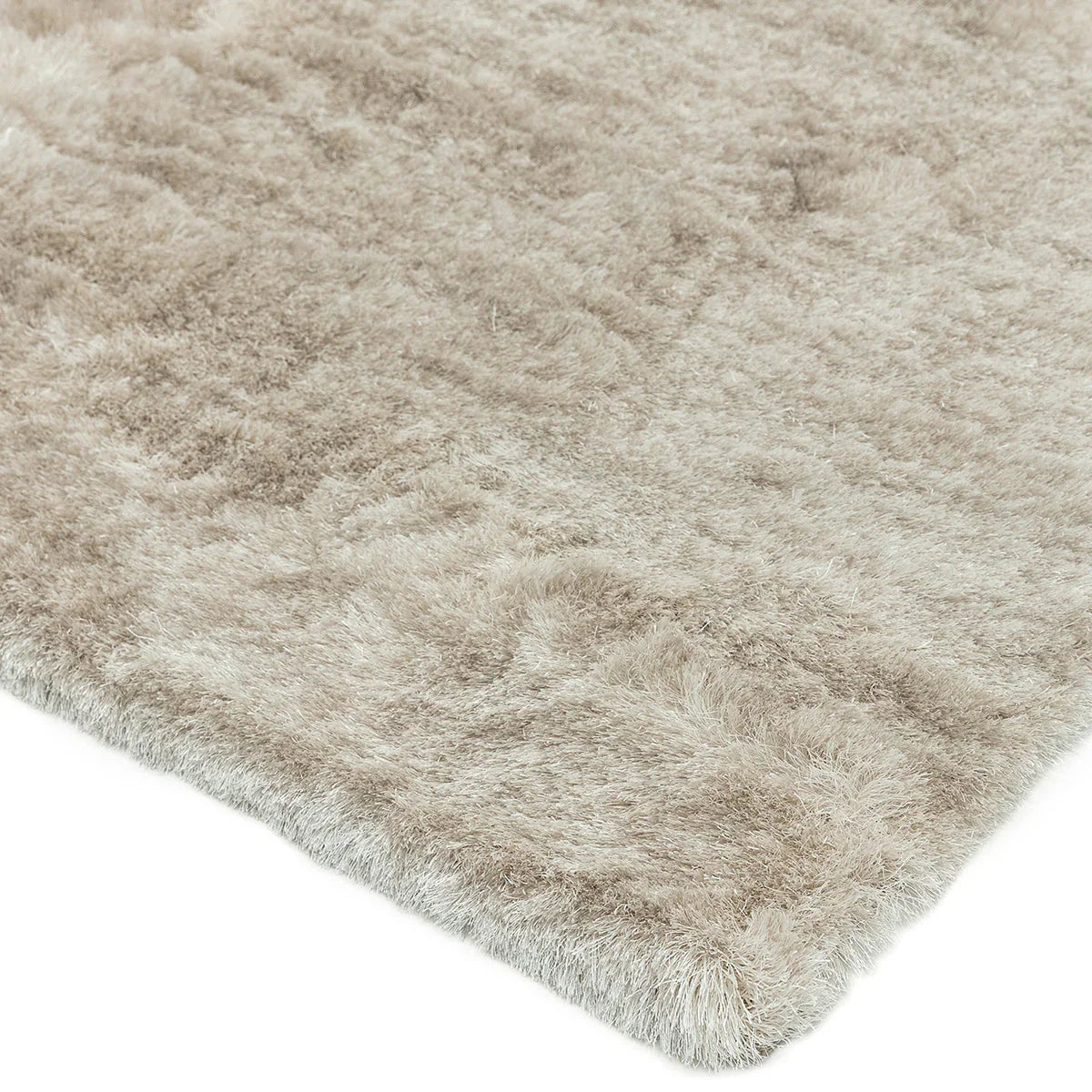 Asiatic Whisper Champagne Designer Rug featuring shaggy texture in champagne, beige and ivory on white background, machine-made
