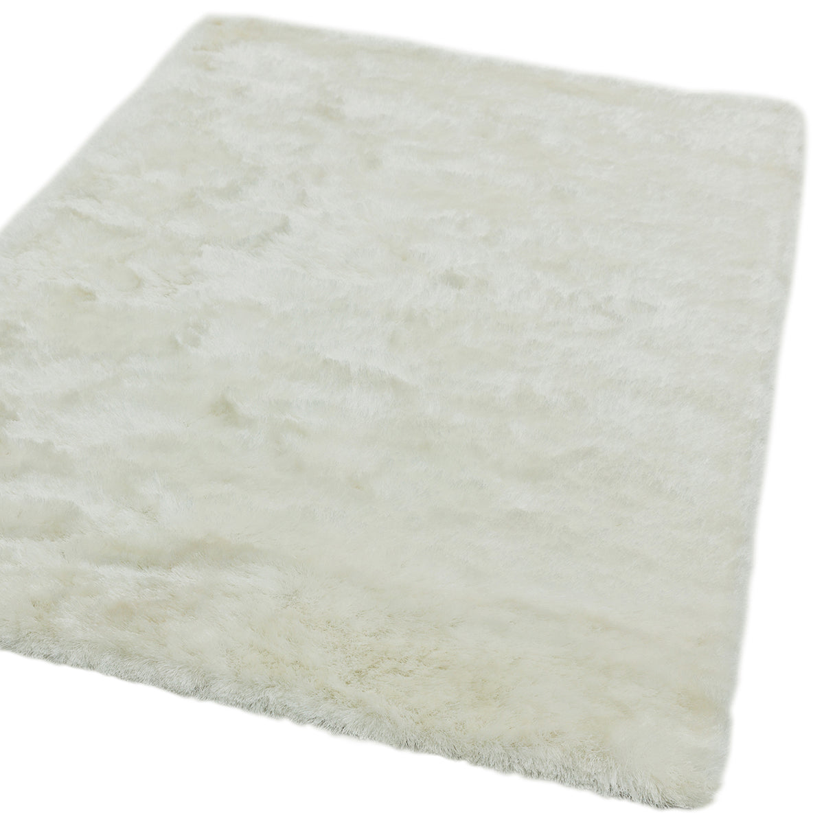 White fluffy rug on a white background