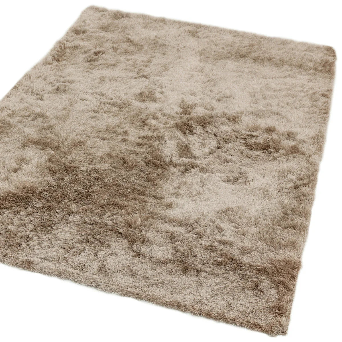 Beige shaggy rug on a white background