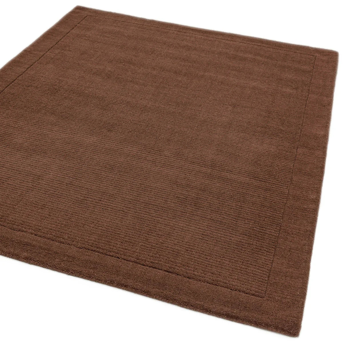 Asiatic York Chocolate rug featuring solid ribbed texture in chocolate brown on cream background, machine-made wool