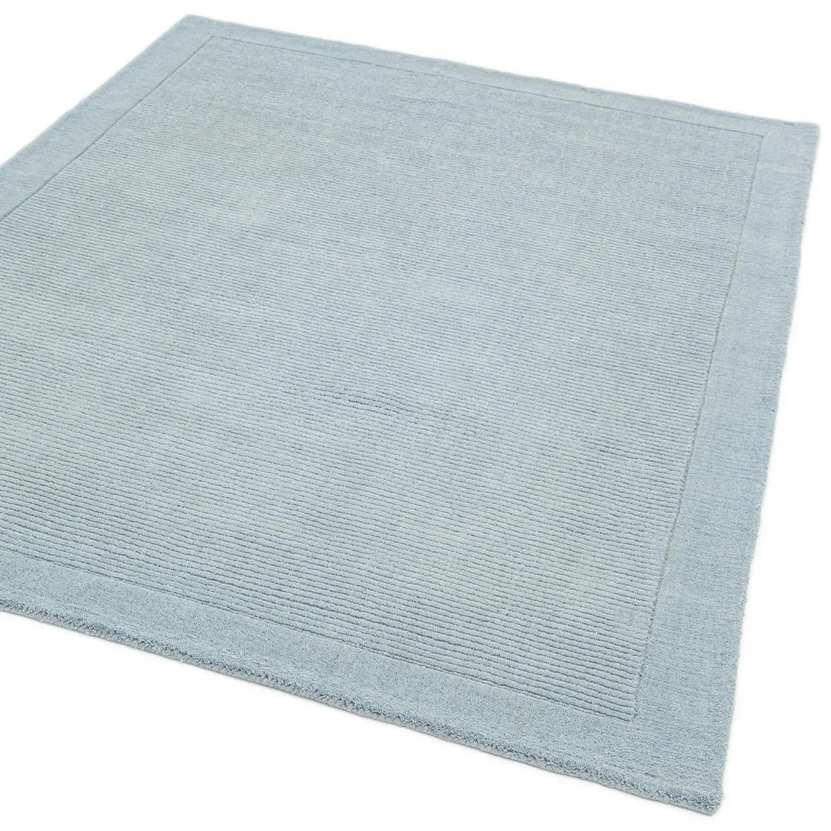 Asiatic York Duck Egg Rug featuring ribbed texture in duck egg blue and pale blue on white background, machine-made wool