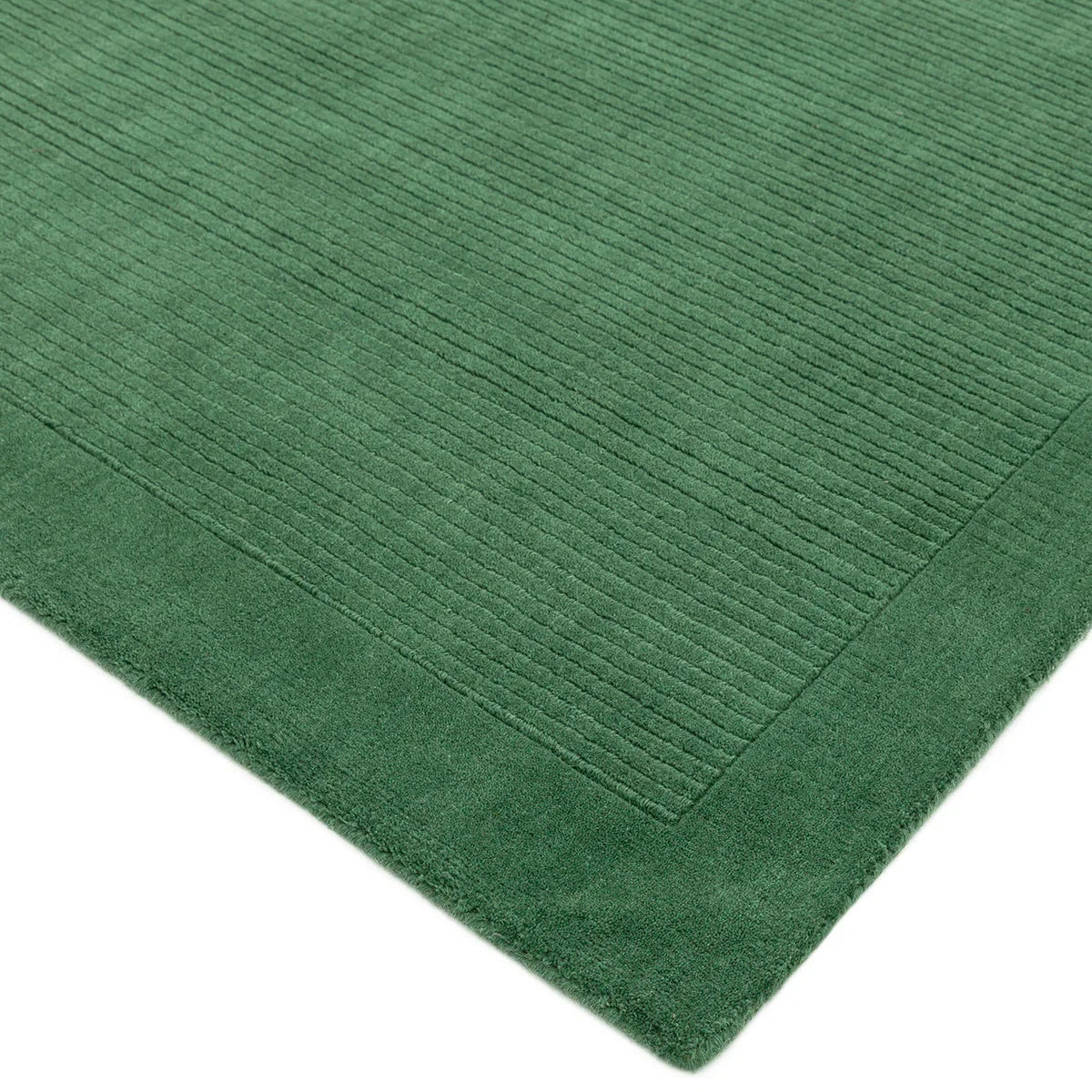 Asiatic York Forest Green Runner Rug with ribbed texture in forest green, dark green border on white, machine-made wool
