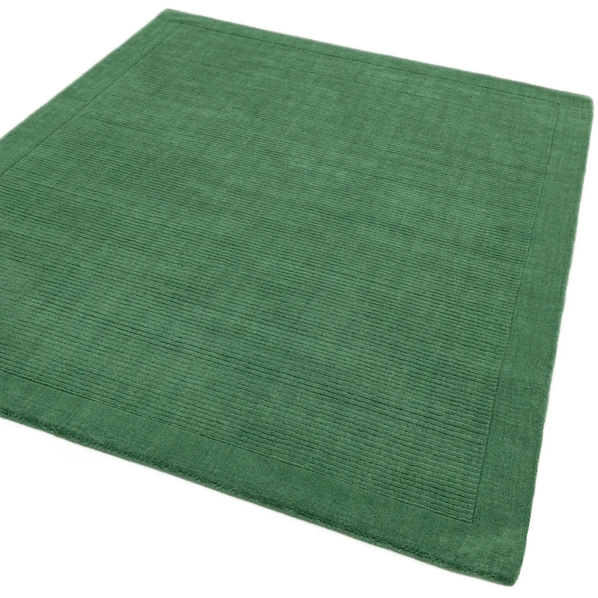 Asiatic York Forest Green Rug featuring ribbed stripes in forest green with border, machine-made polypropylene