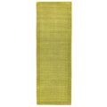 Asiatic York Green runner rug styled in a living room