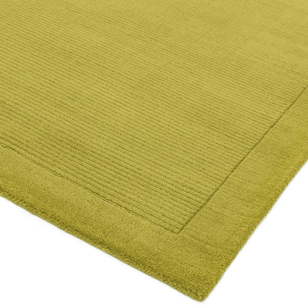 Asiatic York Green Designer Rug featuring ribbed linear texture in olive-green on light background, hand-tufted wool