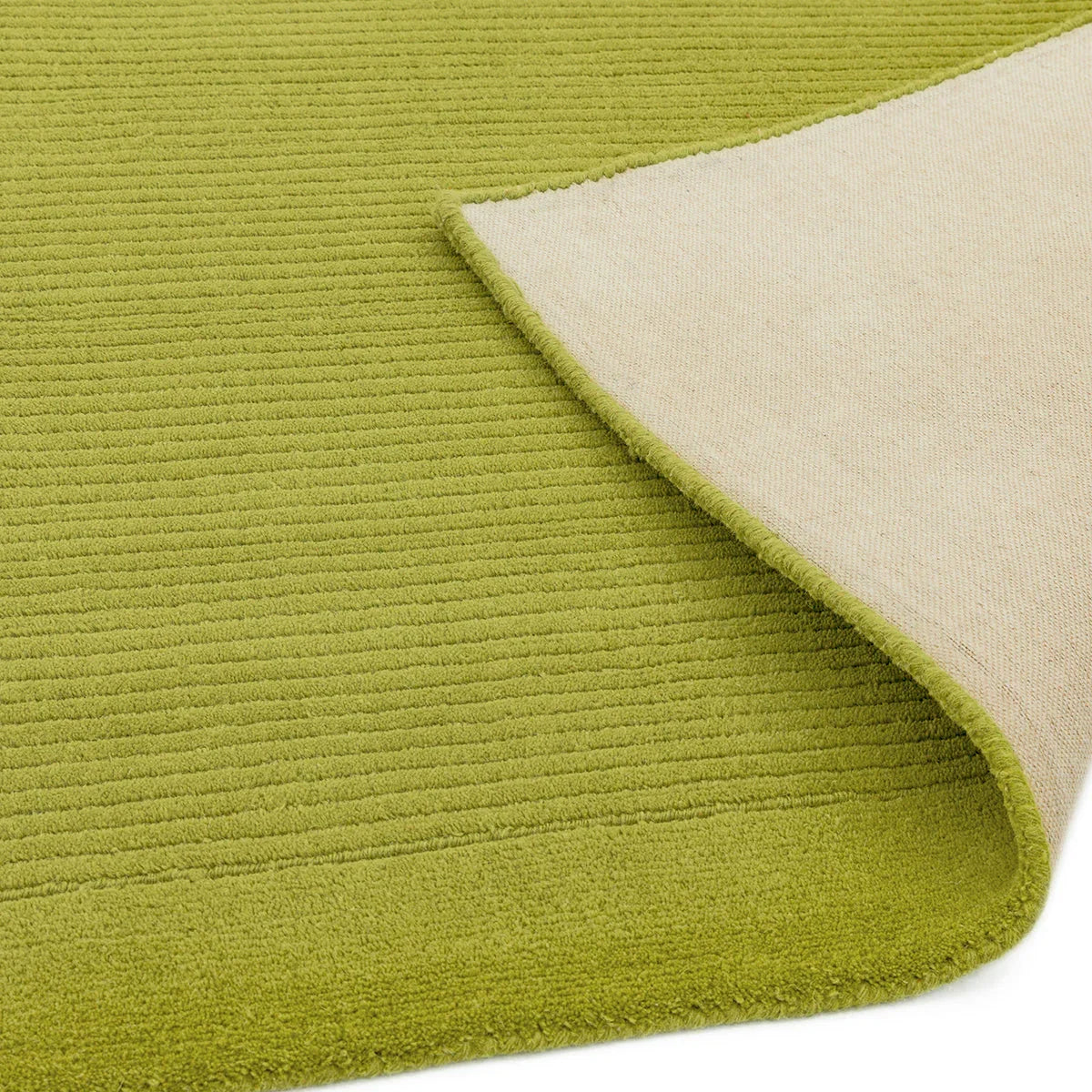 Asiatic York Green Designer Rug featuring ribbed olive-green texture on beige reverse, hand-tufted wool