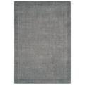 Gray rug with a subtle pattern on a white background