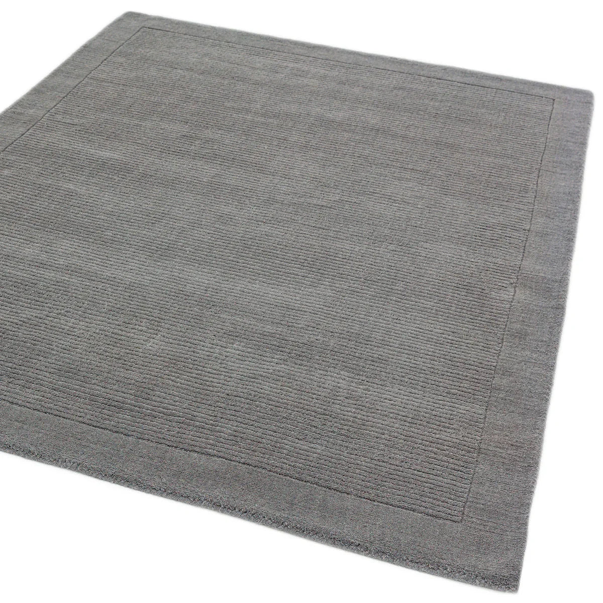 Asiatic York Grey Designer Rug featuring textured striped pattern in charcoal grey, slate grey and steel grey on light background, machine-made polypropylene