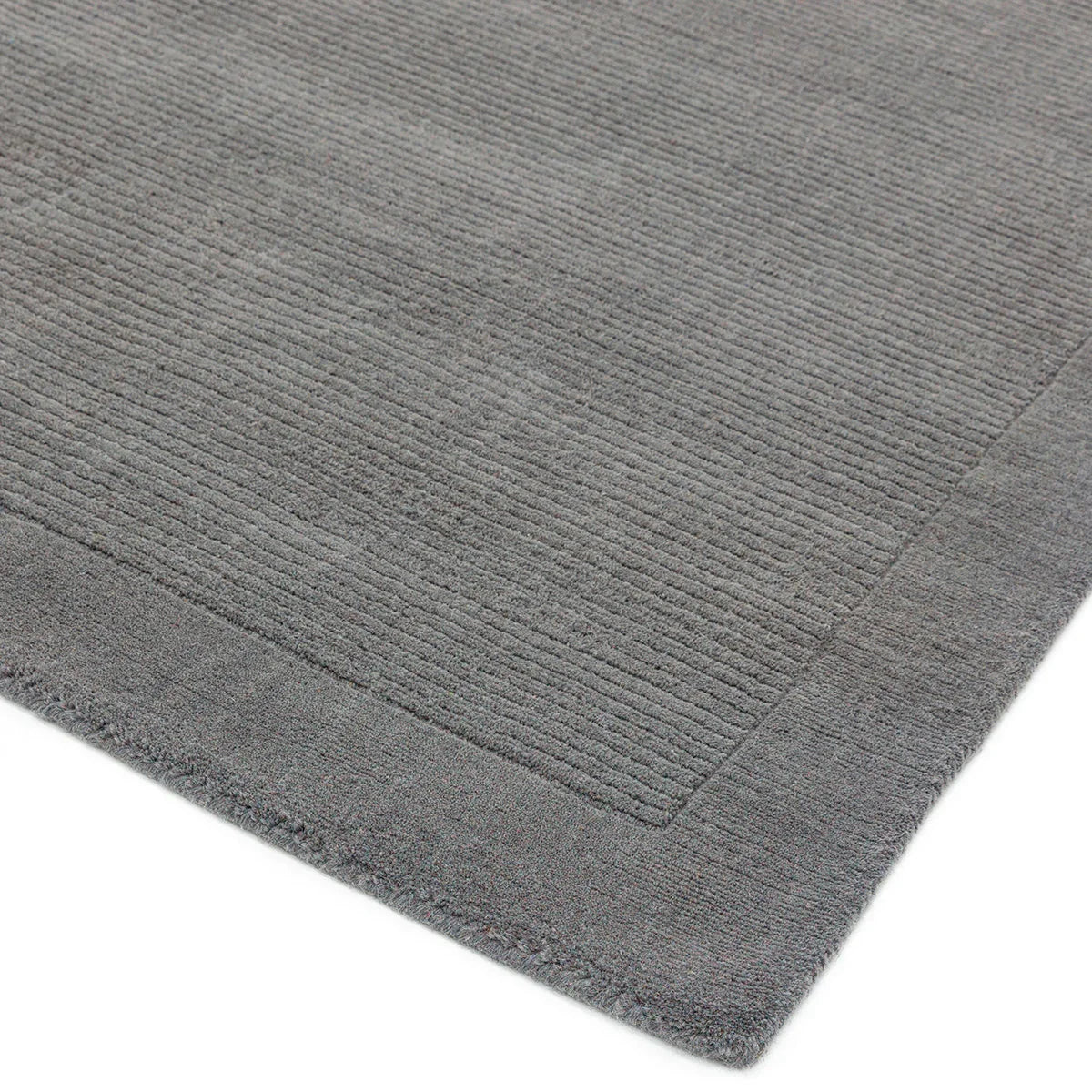 Asiatic York Grey Designer Rug featuring solid ribbed texture in charcoal grey and ash on grey background, hand-finished rug