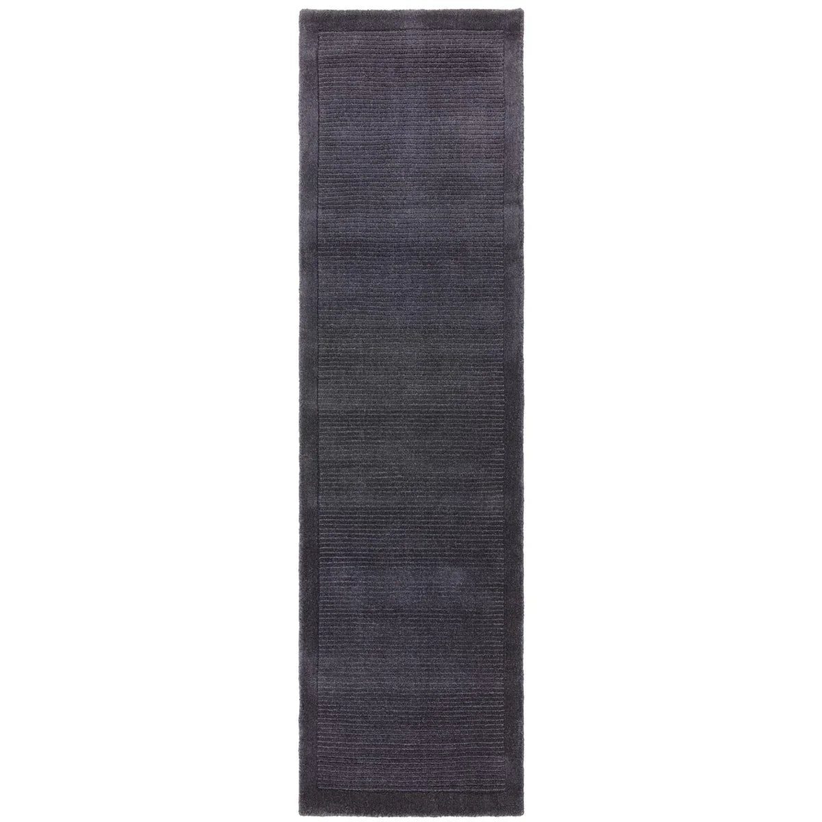 Asiatic York Navy runner rug styled in a living room