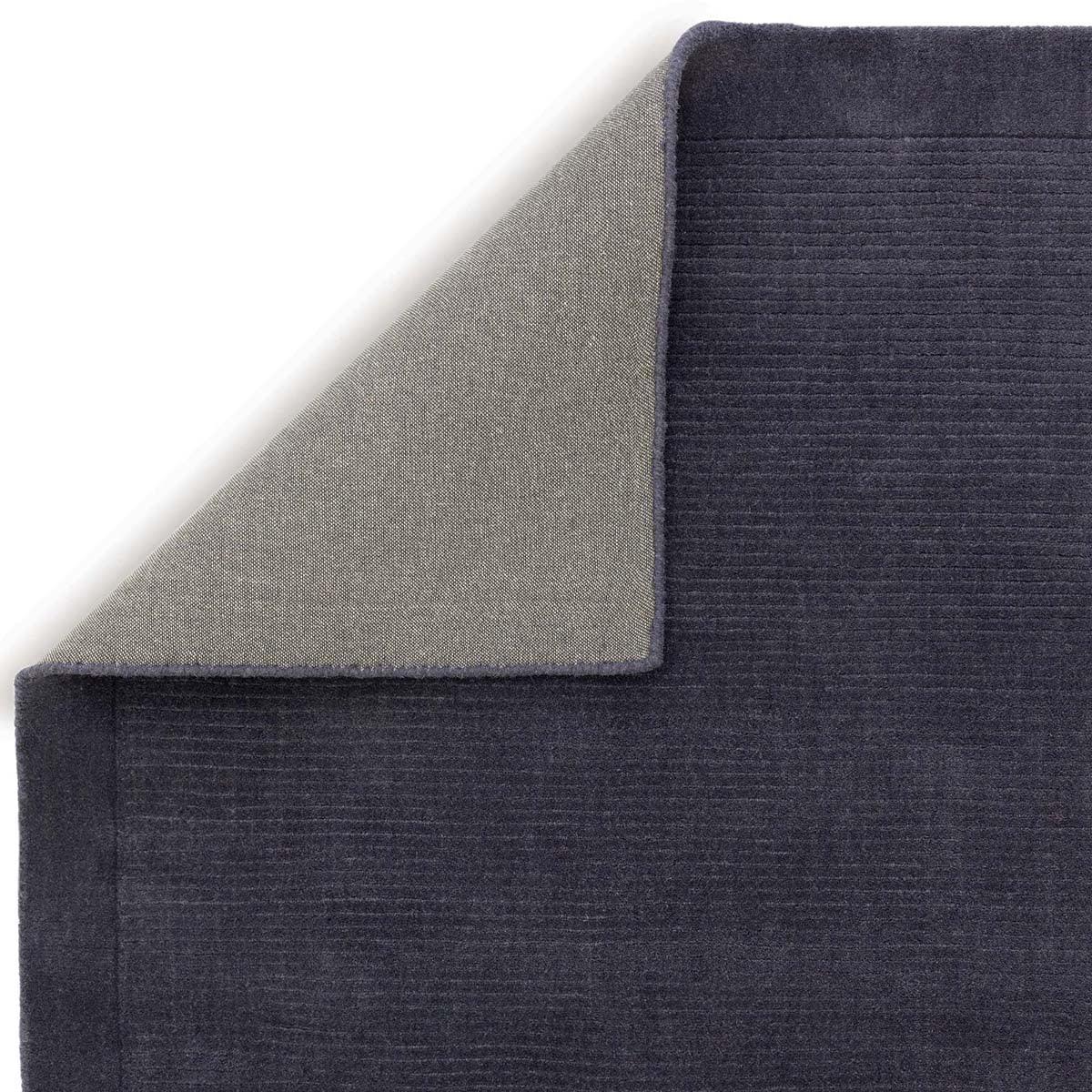 Asiatic York Navy Designer Rug featuring solid tonal weave in navy on light grey reverse, machine-woven wool