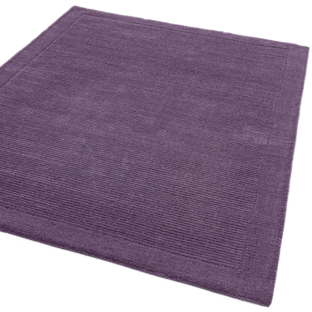 Asiatic York Purple Designer Rug featuring textured ribbed pattern in plum purple on white background, machine-made wool