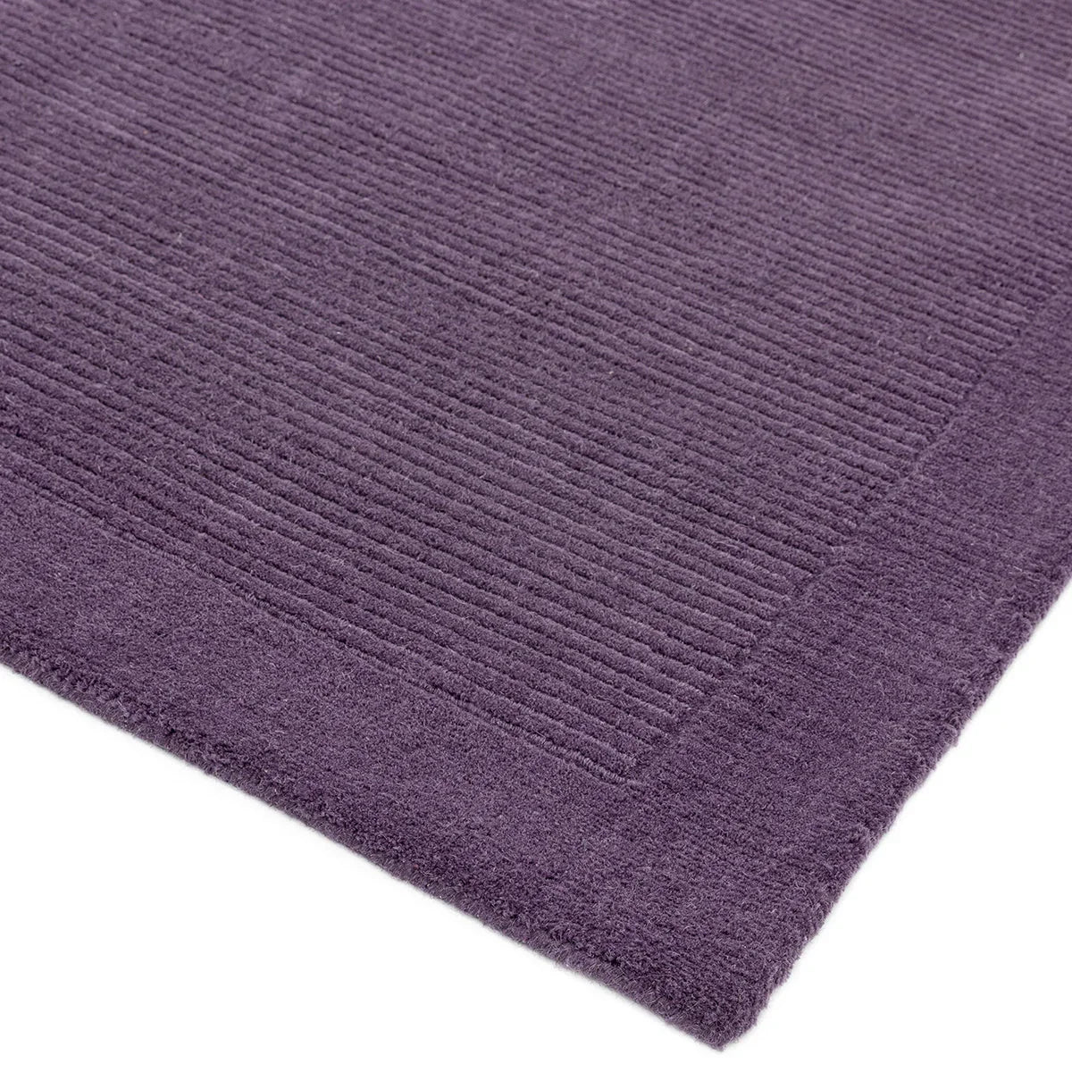 Asiatic York Purple Designer Rug featuring ribbed texture in deep purple on plush purple field, hand-tufted wool
