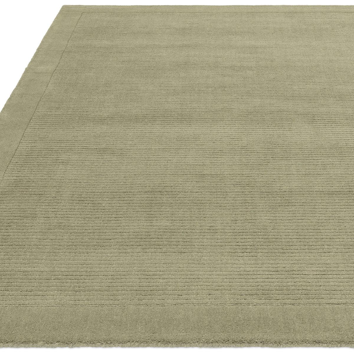 Asiatic York Sage Designer Rug featuring subtle ribbed texture in sage green and taupe on beige background, hand-tufted wool