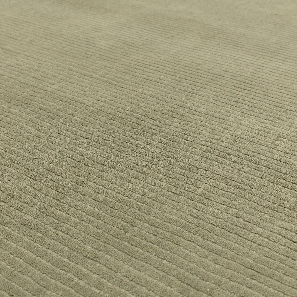 Asiatic York Sage Designer Rug featuring ribbed linear pattern in sage, olive and beige on neutral background, hand-tufted wool