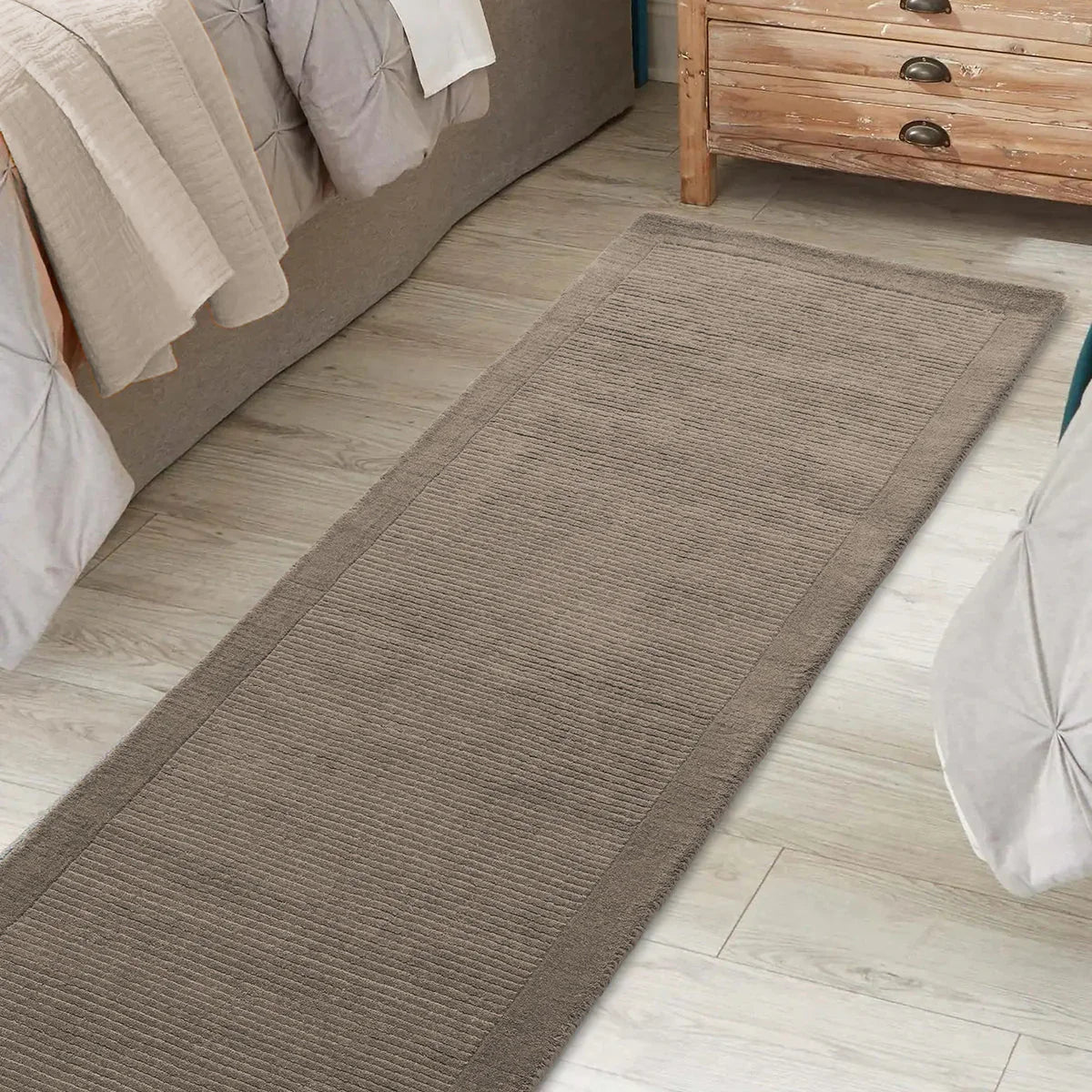 Asiatic York Taupe Runner Designer Rug featuring textured ribbed pattern in taupe, beige and stone on light beige floor, machine-woven wool