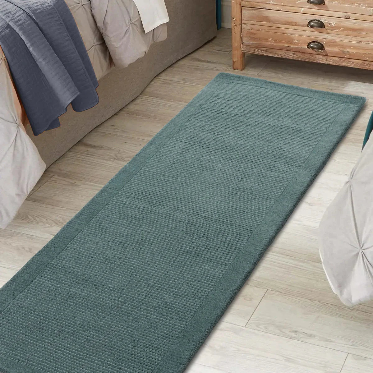 Asiatic York Teal Runner featuring textured ribbed pattern in teal and beige on beige floor, machine-woven synthetic