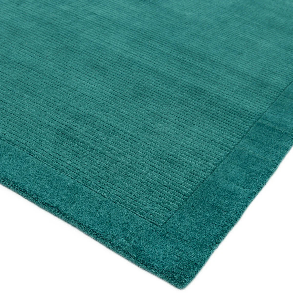 Asiatic York Teal Runner featuring a solid ribbed texture in teal on teal background, power-loomed wool