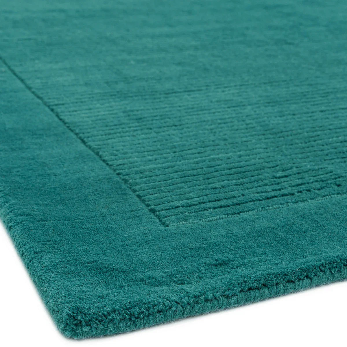Asiatic York Teal Runner featuring ribbed texture in teal and dark teal on white background, hand-tufted wool