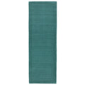 Asiatic York Teal runner rug styled in a living room